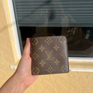 Louis Vuitton Pre-Owned
2003 Cult bi-fold wallet